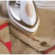 Ferro de Passar a Vapor Oster 1200W Antiaderente Spray Dourado e Branco
